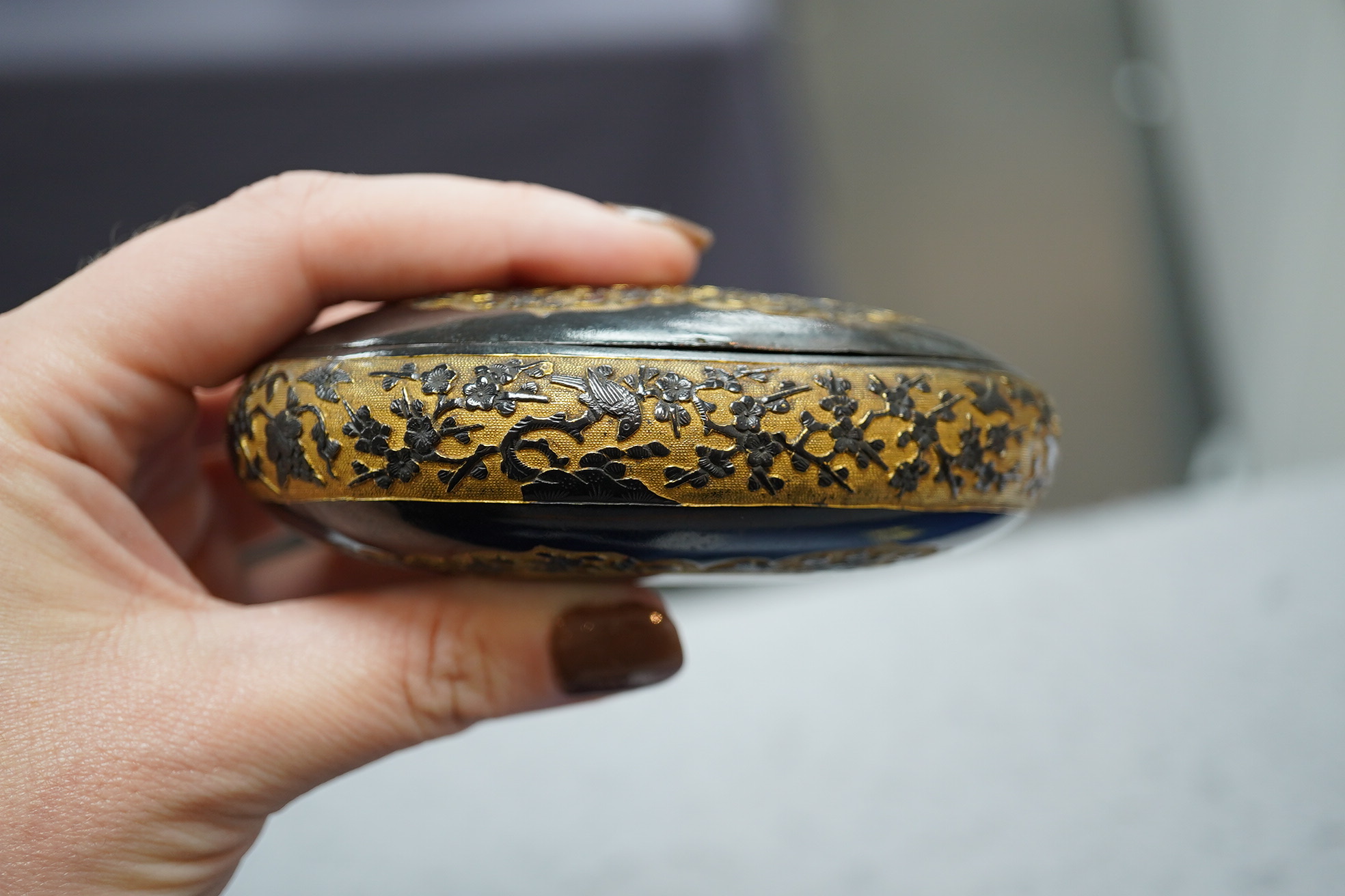 A Japanese export gilt bronze Sawasa oval tobacco box, 18th century